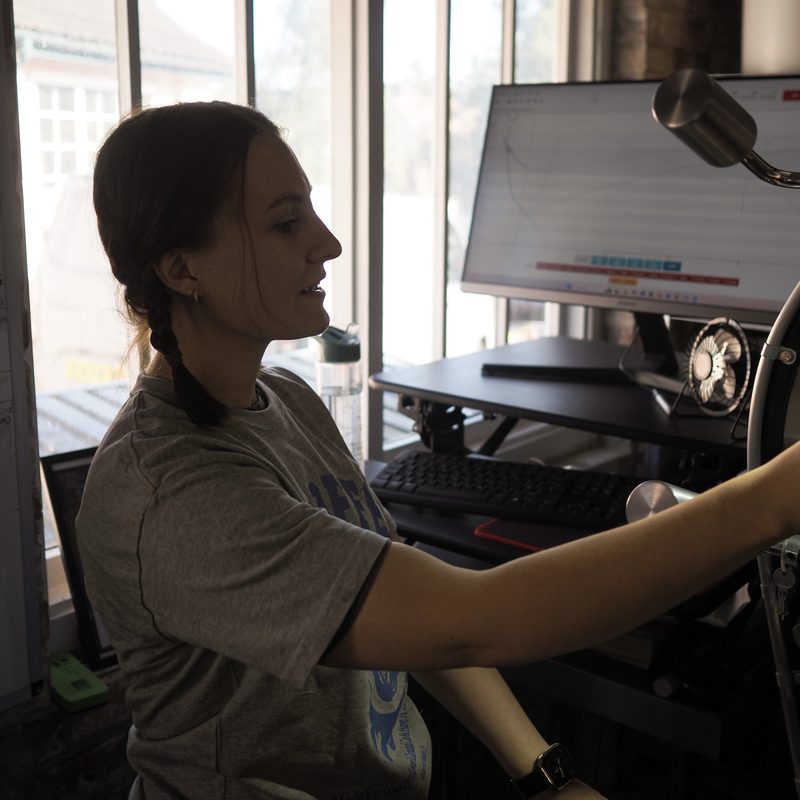 Team member at the coffee roaster controls